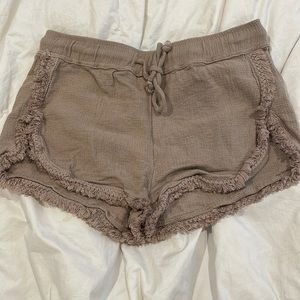 Tan shorts.